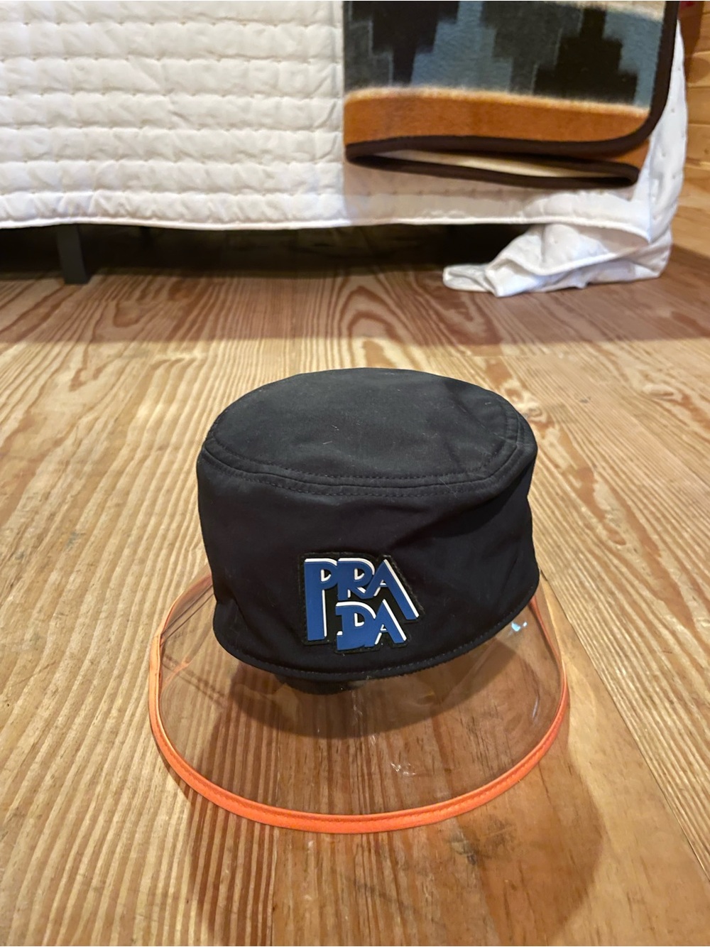 Prada Kids Black Bucket Hat with Clear Visor and Orange Trim